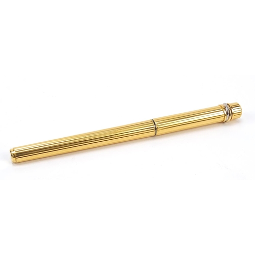 23 - Cartier gold plated fountain pen with 18k gold nib, serial number 119339