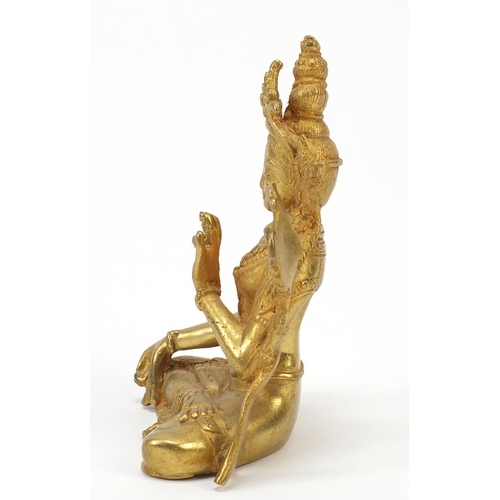 1191 - Chino-Tibetan gilt bronze figure of a deity, 11.5cm high