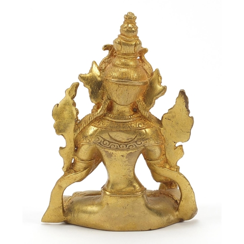 1191 - Chino-Tibetan gilt bronze figure of a deity, 11.5cm high