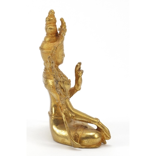 1191 - Chino-Tibetan gilt bronze figure of a deity, 11.5cm high