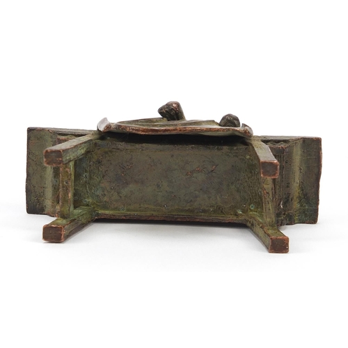 1916 - Chinese bronze monk seated on a bench, 6.5cm wide