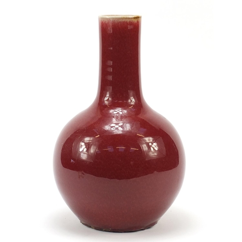 964 - Chinese porcelain vase having a sang de boeuf glaze, 33.5cm high