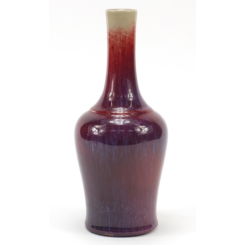 567 - Chinese porcelain vase having a sang de boeuf glaze, 25cm high