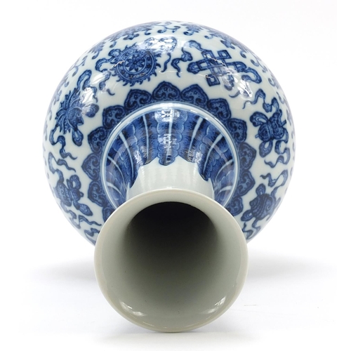 559 - Chinese blue and white porcelain vase finely hand painted with Daoist emblems above flower heads and... 