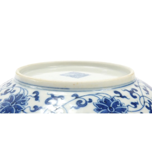 565 - Pair of Chinese blue and white porcelain dishes hand painted with flower heads amongst scrolling fol... 