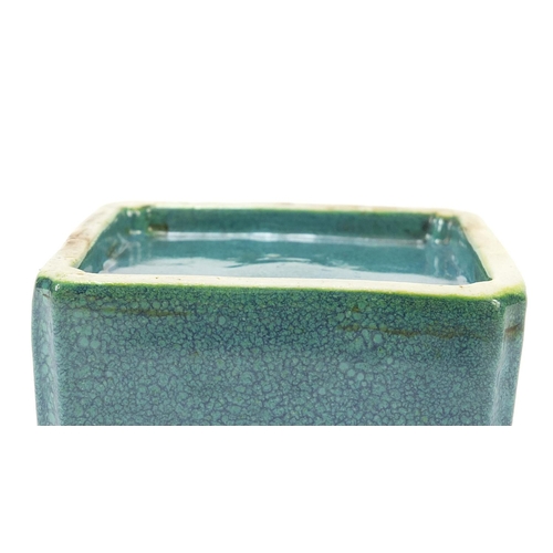 819 - Chinese porcelain slab sided water pot having a spotted turquoise glaze, 6cm high