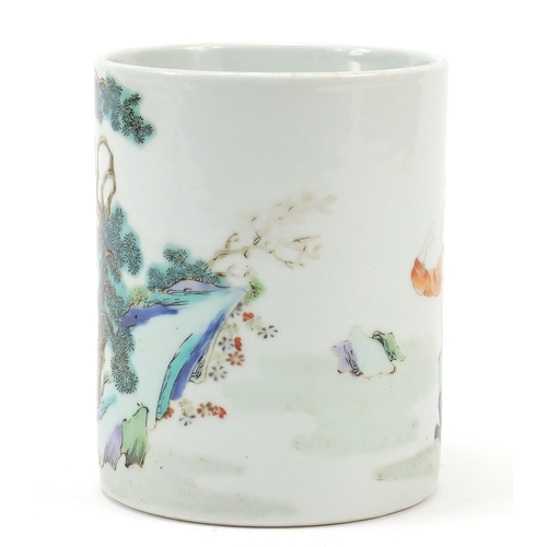 219 - Chinese porcelain cylindrical brush pot hand painted in the famille rose palette with an archer and ... 