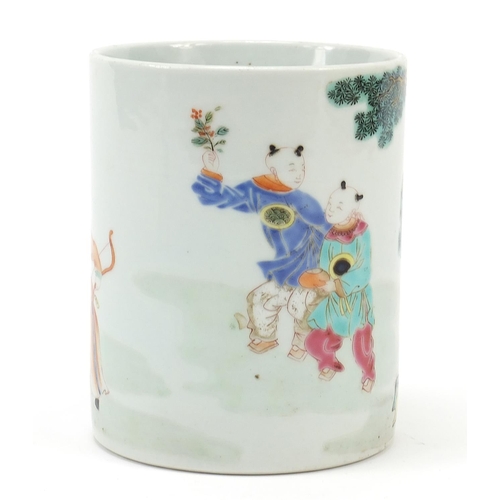 219 - Chinese porcelain cylindrical brush pot hand painted in the famille rose palette with an archer and ... 