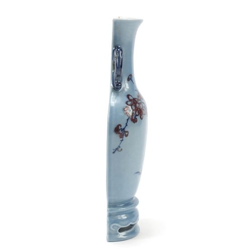 91 - Chinese porcelain vase wall pocket with elephant head handles having a clair de lune glaze, hand pai... 