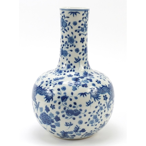 652 - Large Chinese blue and white porcelain vase hand painted with dragons amongst blossoming flowers, fo... 