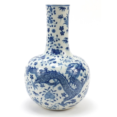 652 - Large Chinese blue and white porcelain vase hand painted with dragons amongst blossoming flowers, fo... 