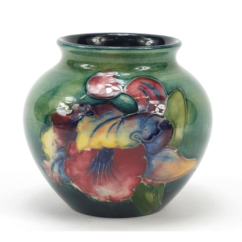 139 - Moorcroft, Pottery baluster vase, hand painted in the Spring Flowers pattern, 7.5cm high