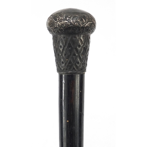 393 - Victorian ebonised walking stick with embossed silver pommel, London 1894, 85cm in length