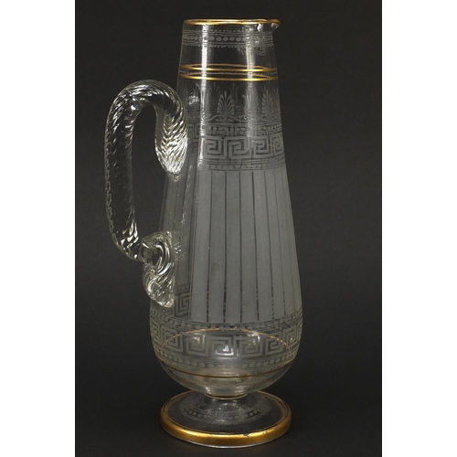 771 - 19th century cut and etched glass jug with Greek key borders, 28cm high