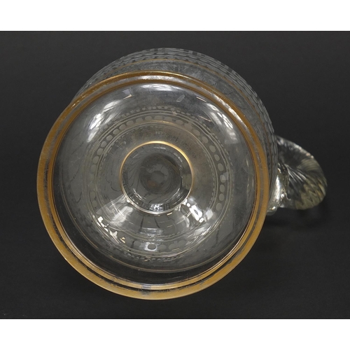 771 - 19th century cut and etched glass jug with Greek key borders, 28cm high