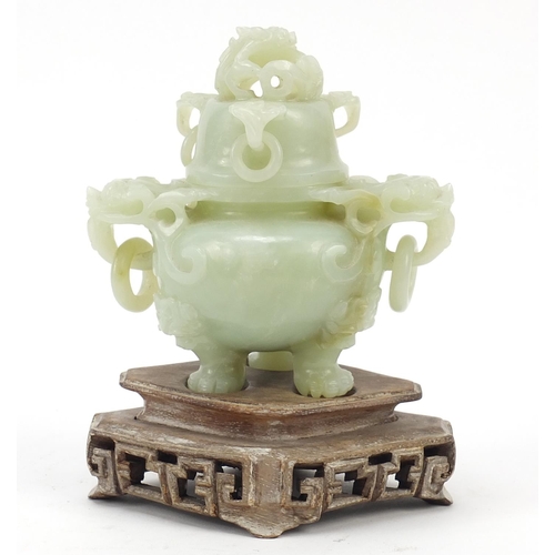 37 - Chinese carved green jade tripod censer with ring turned dragon handles on carved hardwood stand, ov... 