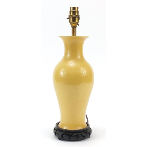 821 - Chinese porcelain baluster vase lamp base having a yellow glaze, hand painted with flowers, raised o... 