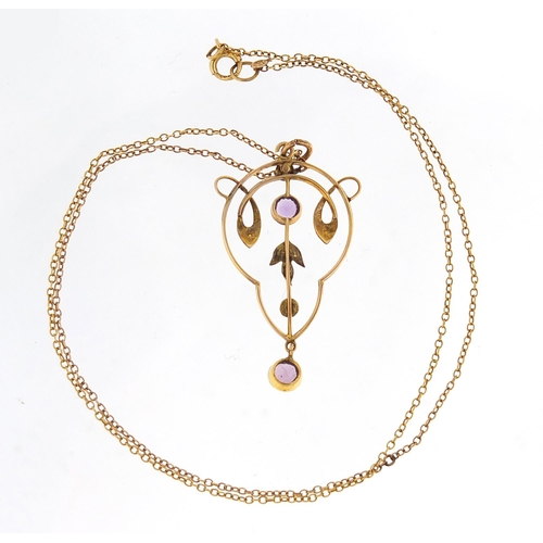 17 - Art Nouveau unmarked gold amethyst and seed pearl pendant on a 9ct gold necklace, 4cm high and 40cm ... 