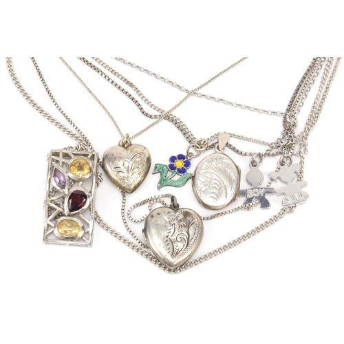 993 - Six silver pendants on silver necklaces including love heart lockets and one set with semi precious ... 