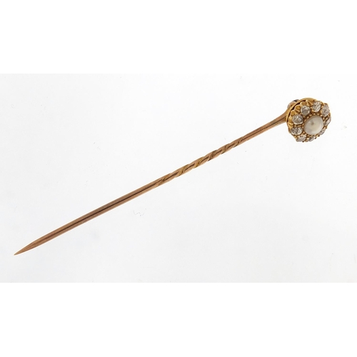 323 - Victorian unmarked gold, diamond and pearl tie pin with unmarked gold lapel mount, housed in a Arthu... 