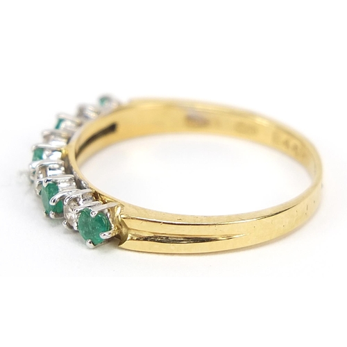 538 - 18ct gold diamond and emerald half eternity ring, size N, 2.5g