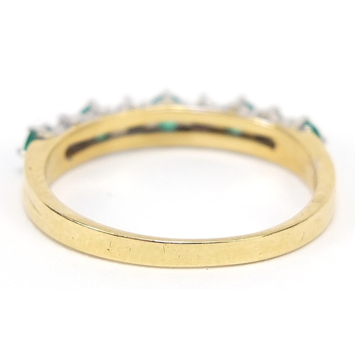 538 - 18ct gold diamond and emerald half eternity ring, size N, 2.5g