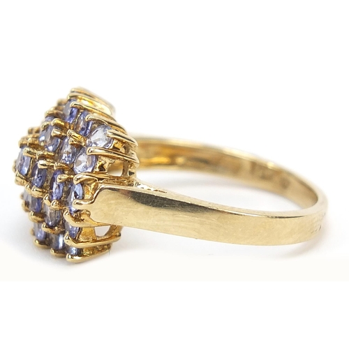 1031 - 9ct gold tanzanite cluster ring, size Q, 4.9g