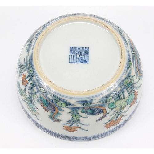 960 - Chinese doucai porcelain bowl hand painted with ducklings in water amongst lily pads and flowers, si... 