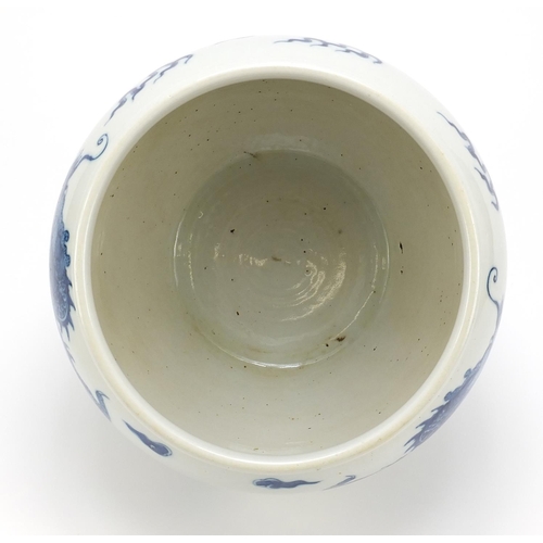 955 - Good Chinese blue and white porcelain jardinière hand painted with dragons chasing a flaming pearl a... 