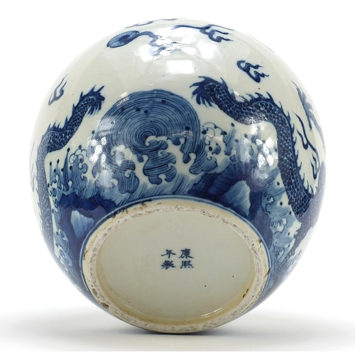 955 - Good Chinese blue and white porcelain jardinière hand painted with dragons chasing a flaming pearl a... 