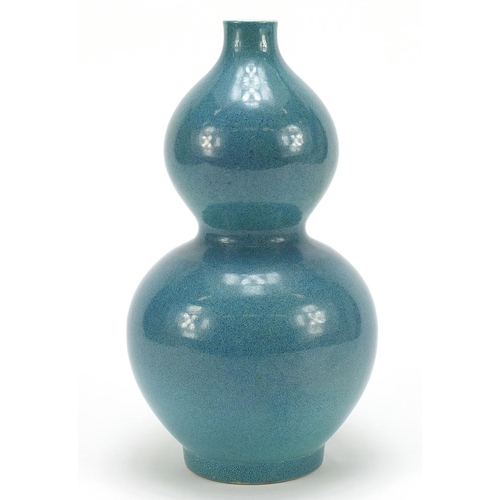 816 - Chinese porcelain double gourd vase having a spotted turquoise glaze, 25.5cm high