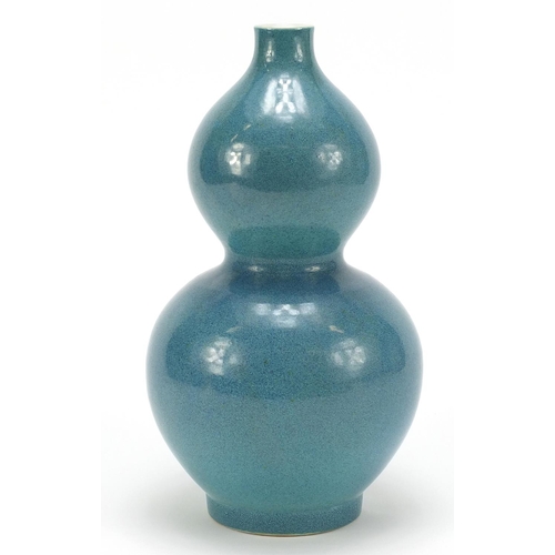 816 - Chinese porcelain double gourd vase having a spotted turquoise glaze, 25.5cm high