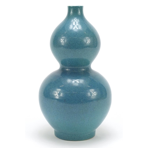 816 - Chinese porcelain double gourd vase having a spotted turquoise glaze, 25.5cm high