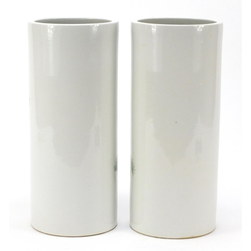 660 - Pair of Chinese porcelain cylindrical vases hand painted with cranes amongst pine trees, 28.5cm high