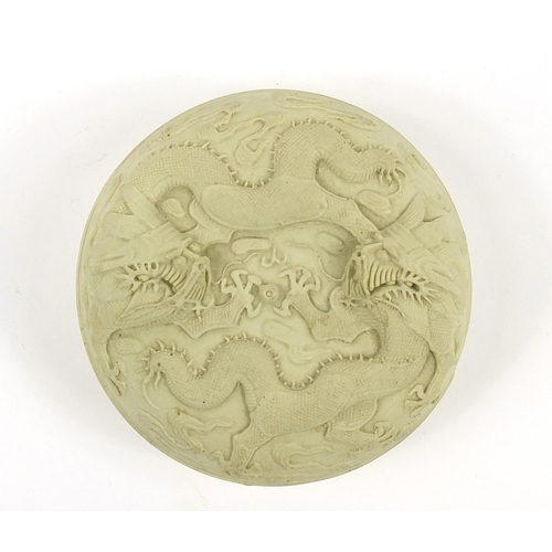 825 - Chinese Yixing type Rouge seal box and cover decorated in relief with two dragons chasing a flaming ... 