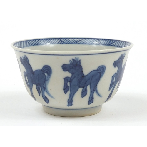 818 - Chinese blue and white porcelain tea bowl and saucer hand painted with horses, the largest 11.5cm in... 