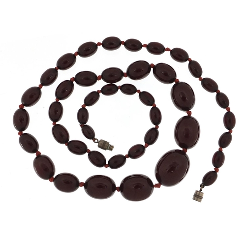 992 - Cherry amber coloured graduated bead necklace, 60cm in length, 35.5g