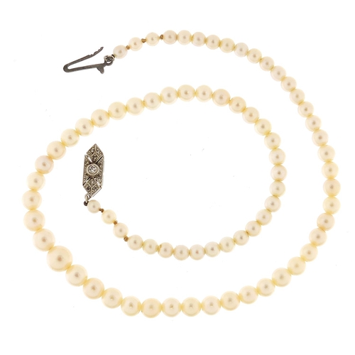 463 - Graduated cultured pearl necklace with unmarked white metal diamond clasp, 40cm in length, 19.1g