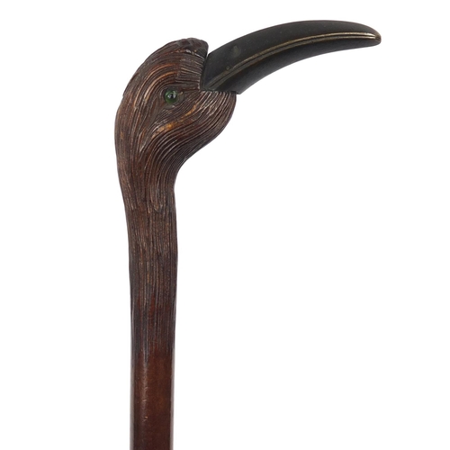 391 - 19th/20th century century silk parasol with carved wood handle in the form of a bird with horn beak ... 