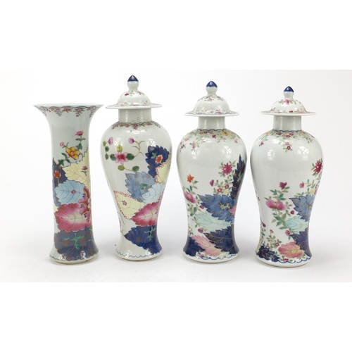 341 - Chinese porcelain four piece garniture comprising three baluster vases with covers and a cylindrical... 