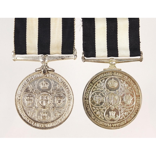 699 - Two Service Medal of the Order of St John medals including one awarded to N/MEM.PERRIS LONDON. S. J.... 