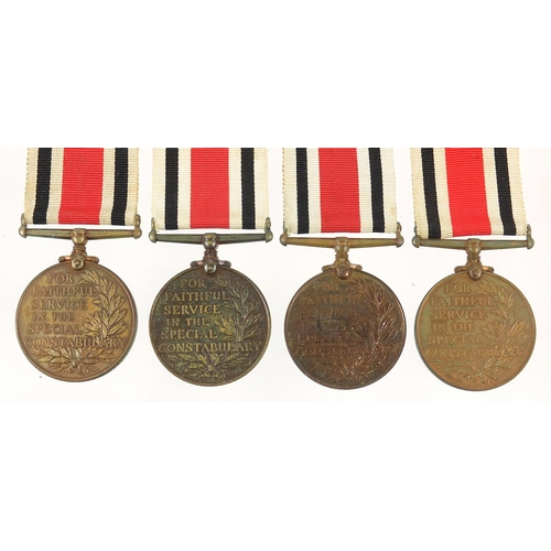 701 - Four George V Special Constabulary Service medals awarded to THOMAS F DARLINGTON, RONALD FREMANTLE, ... 