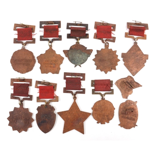 696 - Ten Chinese Cultural Revolution medals and a badge