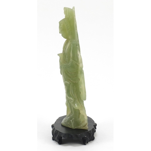 355 - Chinese green hardstone carving of Guan Yin on stand, overall 22cm high