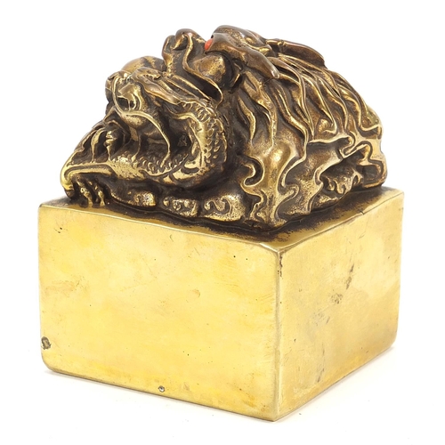 103 - Large Chinese bronze dragon seal, four figure character marks to the base, 9.5cm high