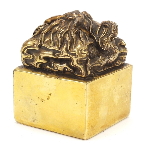 103 - Large Chinese bronze dragon seal, four figure character marks to the base, 9.5cm high