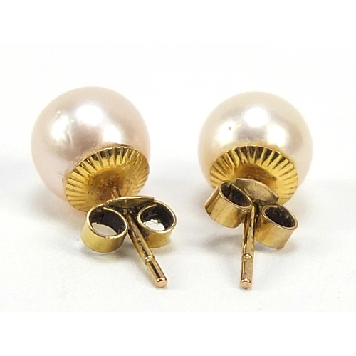 1032 - Pair of 9ct gold pearl stud earrings, 8mm in diameter, 1.8g