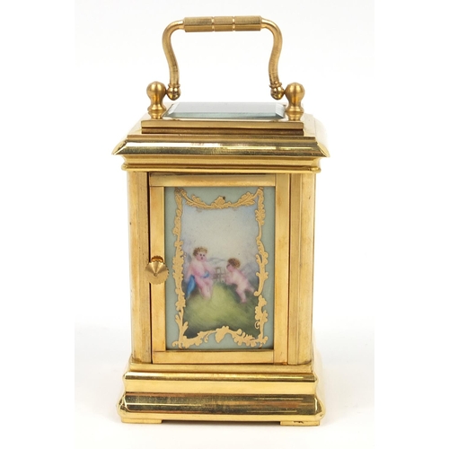 511 - Gilt brass miniature carriage clock with Sevres type panels, 8cm high