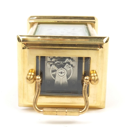 511 - Gilt brass miniature carriage clock with Sevres type panels, 8cm high