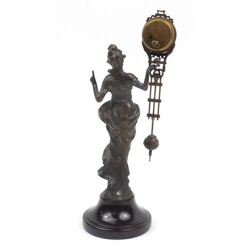 516 - Art Nouveau design figural mystery clock in the form of a maiden, 33.5cm high